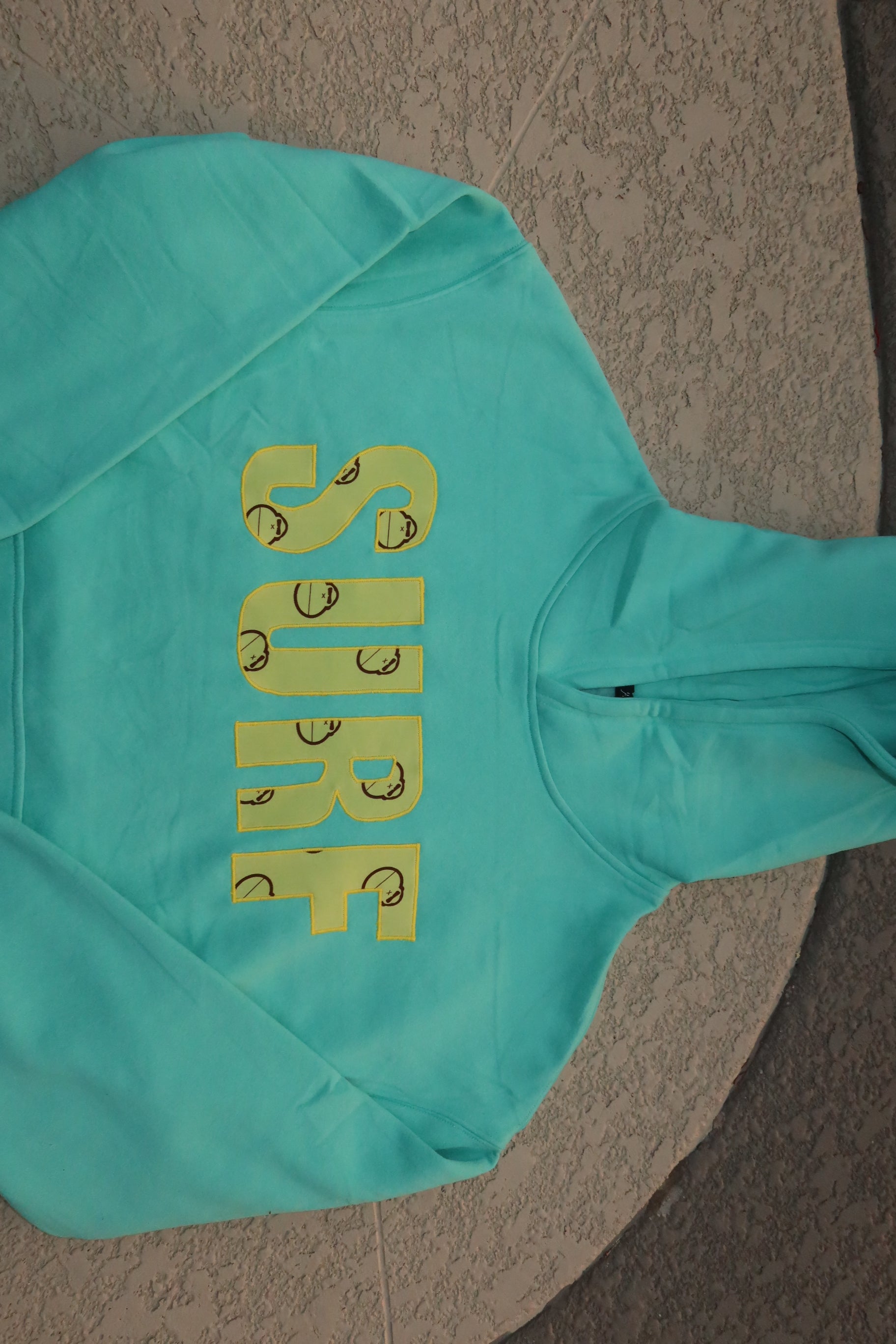 turquoise sun bum surf hoodie